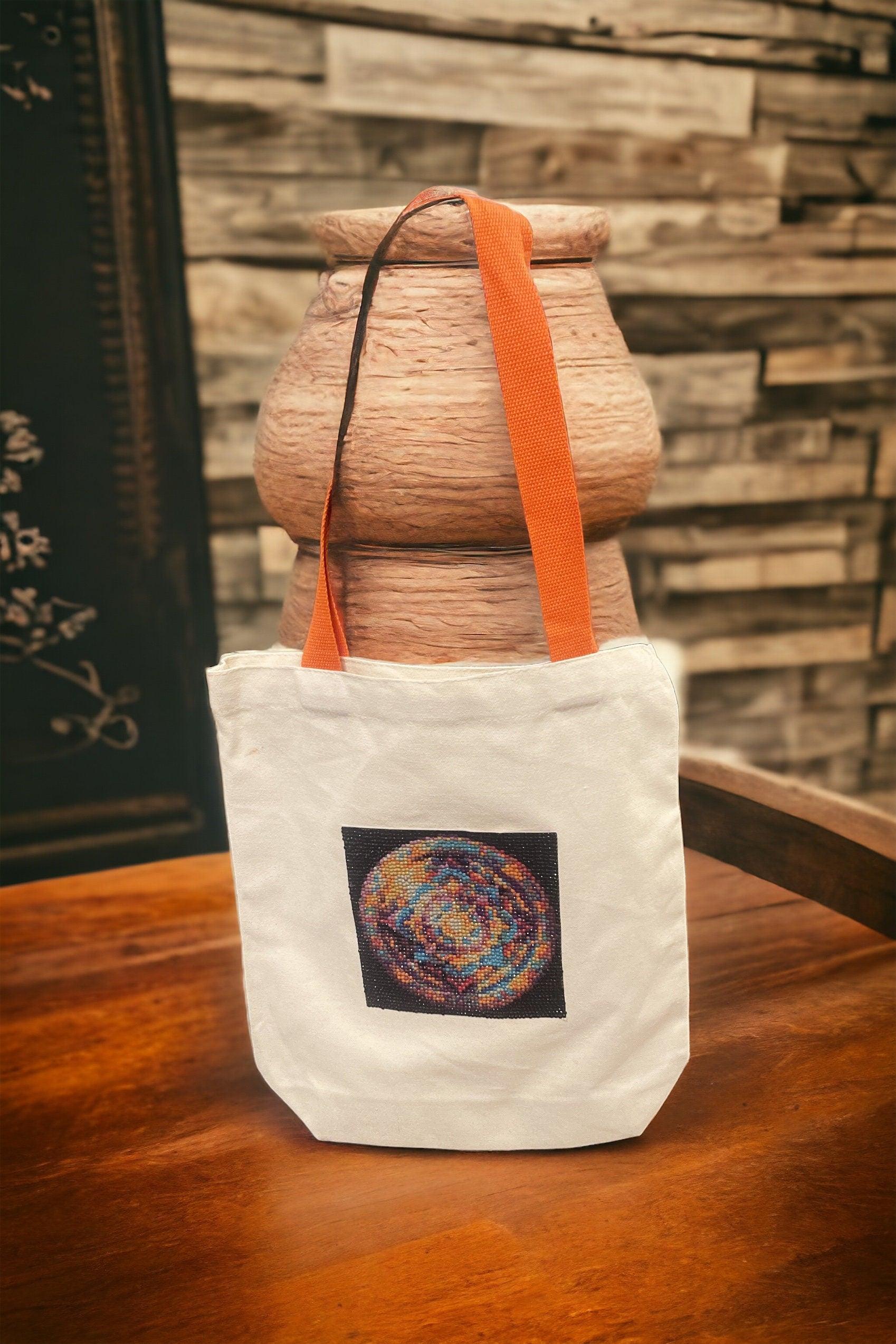 Handmade diamond art mandala canvas tote bag with colorful geometric design, durable fabric, and sturdy handles.