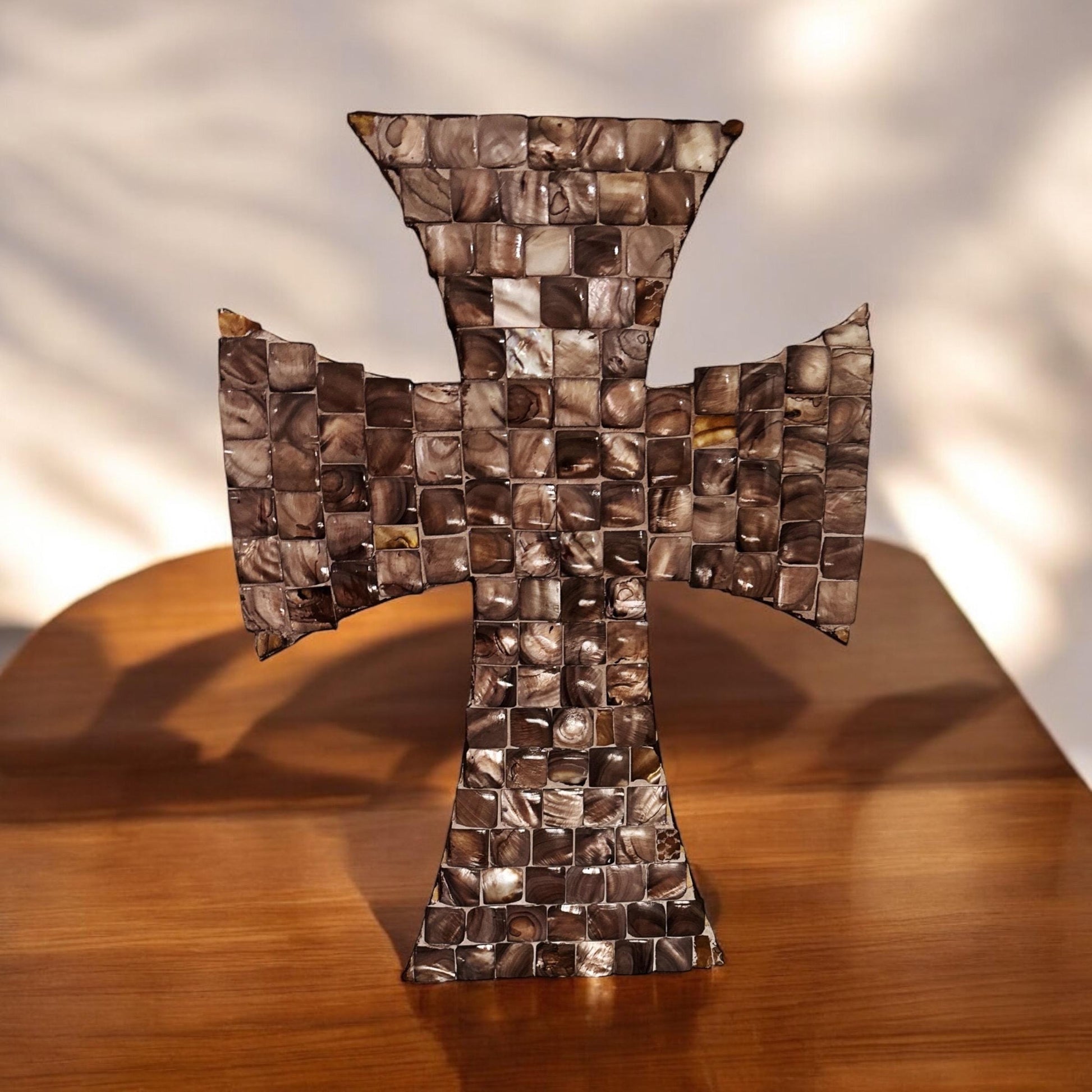 Mother of Pearl mosaic cross with intricate pearl inlay and decorative design, showcasing craftsmanship and elegant religious decor.