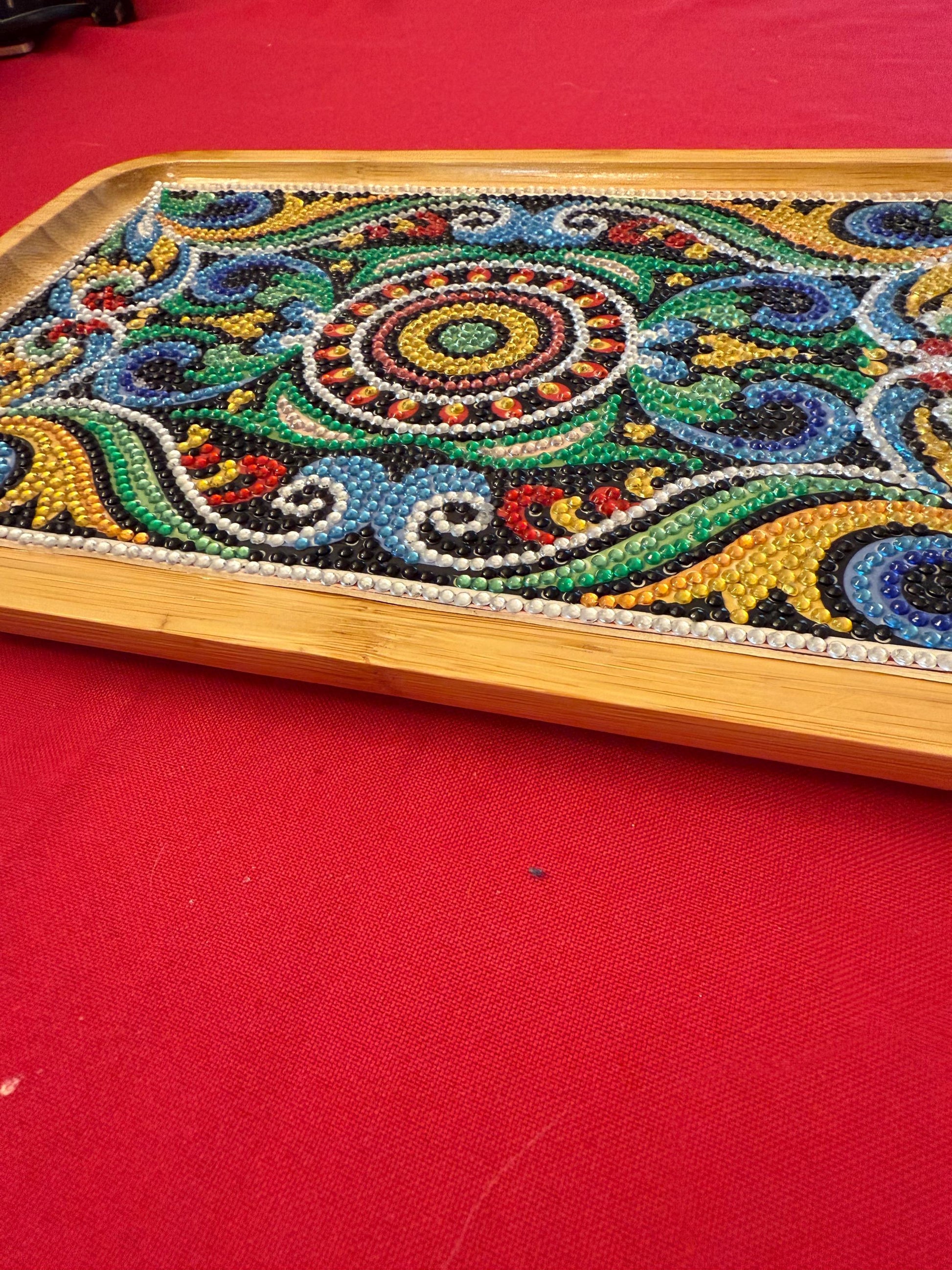 Handcrafted diamond art bamboo serving tray with intricate painted design, natural wood finish, and sturdy handles for serving.
