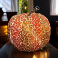 Handmade decorative fall pumpkin from My Store, featuring orange and brown accents with textured surface for autumn decor.