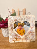 Mother of pearl personalized frame with intricate design, perfect for displaying photos or keepsakes.