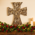 Mother of pearl mosaic cross with intricate pearl inlay, featuring a detailed religious design on a decorative background.