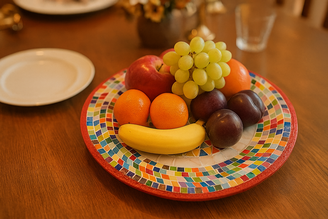Colorful handcrafted mosaic fruit bowl with vibrant glass pieces, showcasing a unique decorative design for kitchen or dining use.