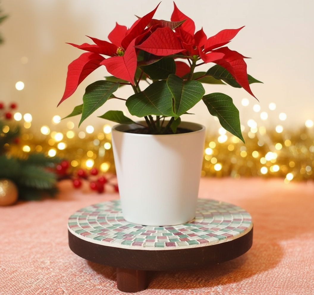 Handcrafted pink and green mosaic plant stand by Miss Bette's Creations, featuring intricate tile patterns and sturdy design.
