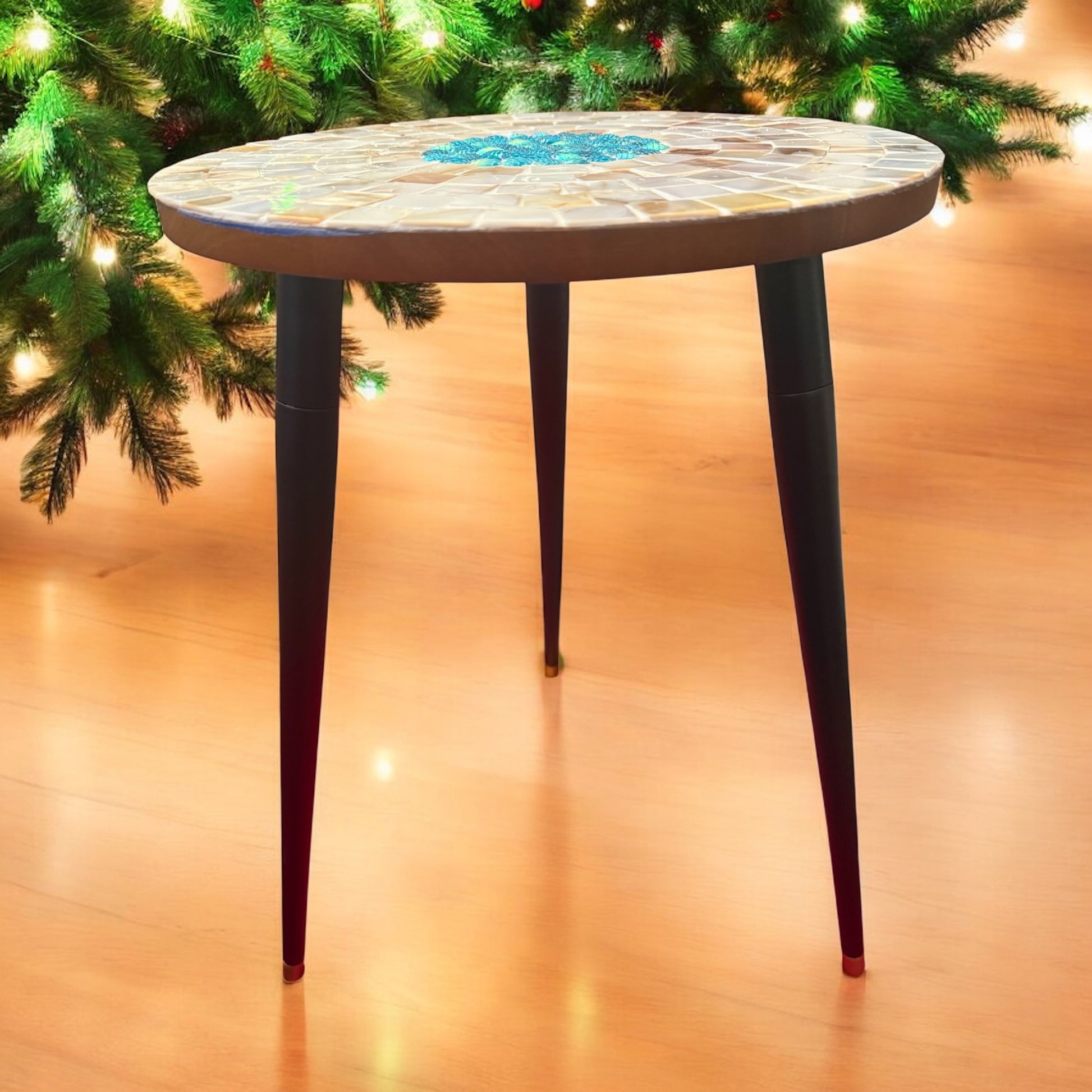 Tall mother of pearl mosaic plant stand by Miss Bette's Creations with intricate pearl tile design and sturdy wooden legs.