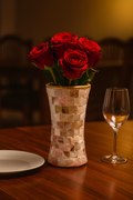 Elegant mother of pearl mosaic flower vase featuring intricate floral design and a glossy finish, perfect for decorative home display.