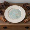 Multicolored rainbow mosaic fruit plate with vibrant, intricate tile design showcasing fresh fruits on a decorative platter.