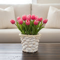 Handcrafted seashell mosaic plant pot with colorful shell patterns, ideal for indoor or outdoor decorative plants.