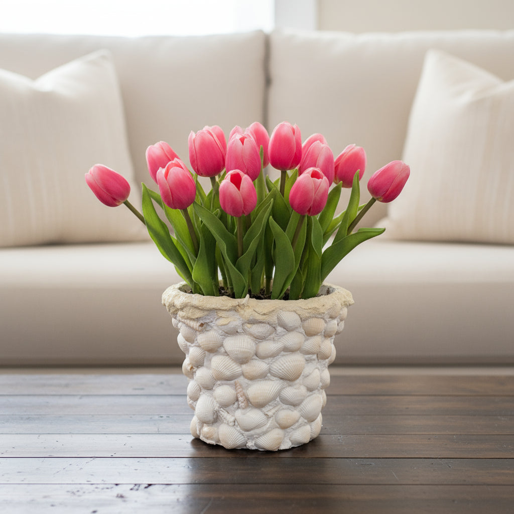 Handcrafted seashell mosaic plant pot with colorful shell patterns, ideal for indoor or outdoor decorative plants.