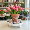 Handcrafted white rainbow mosaic plant stand with colorful tiled design, ideal for displaying potted plants indoors or outdoors.