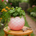 Handcrafted scalloped pink ombre mosaic bowl with intricate tile pattern, showcasing vibrant colors and detailed craftsmanship.