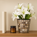 Handcrafted bronze and pearl mosaic planter with intricate design, perfect for indoor or outdoor plant display.