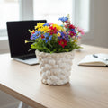 Handcrafted seashell mosaic plant pot featuring colorful seashells and a sturdy ceramic base, ideal for indoor or outdoor plants.