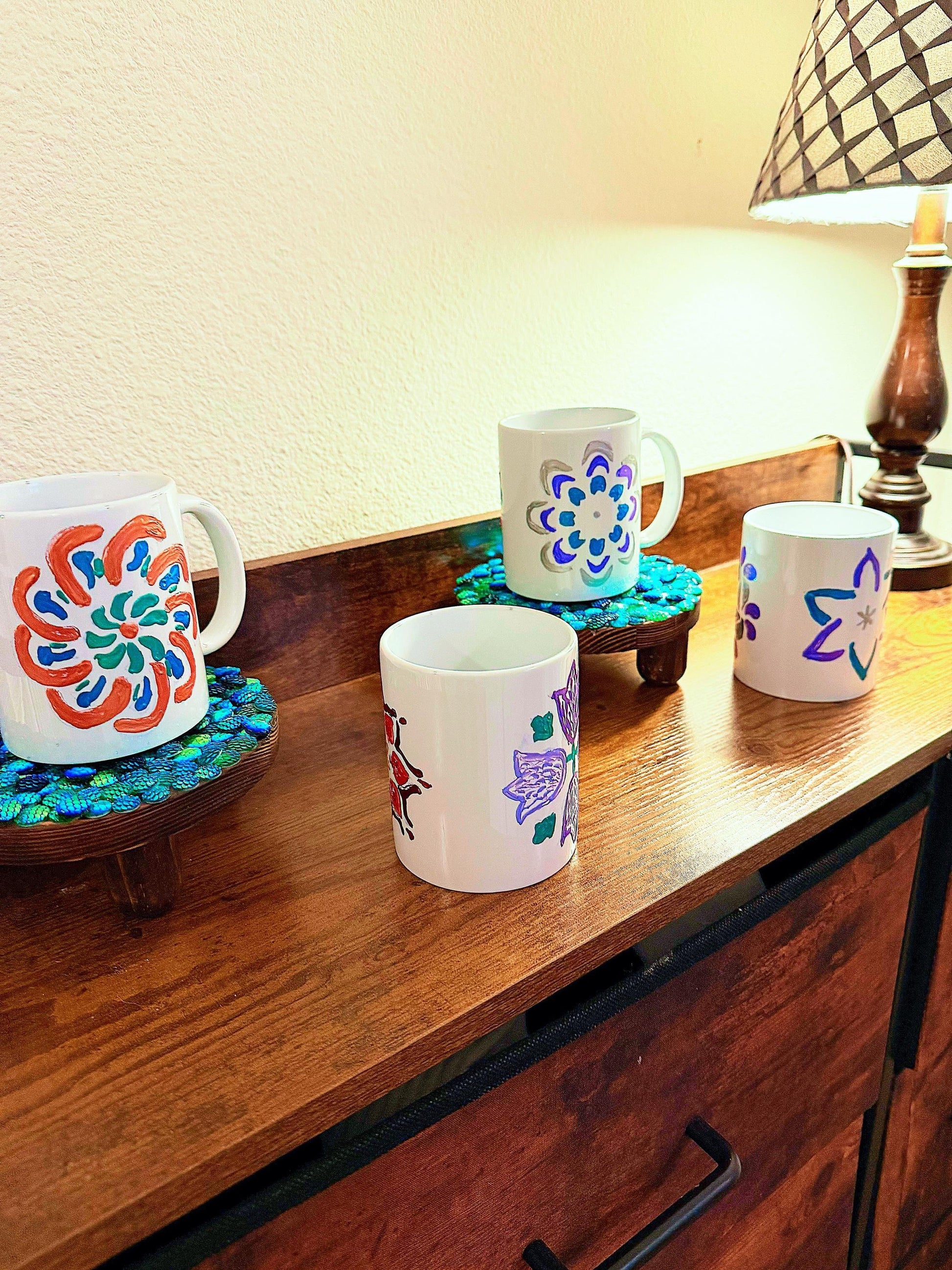 Handpainted coffee mug with colorful floral design, ceramic cup from My Store featuring vibrant, detailed artwork.