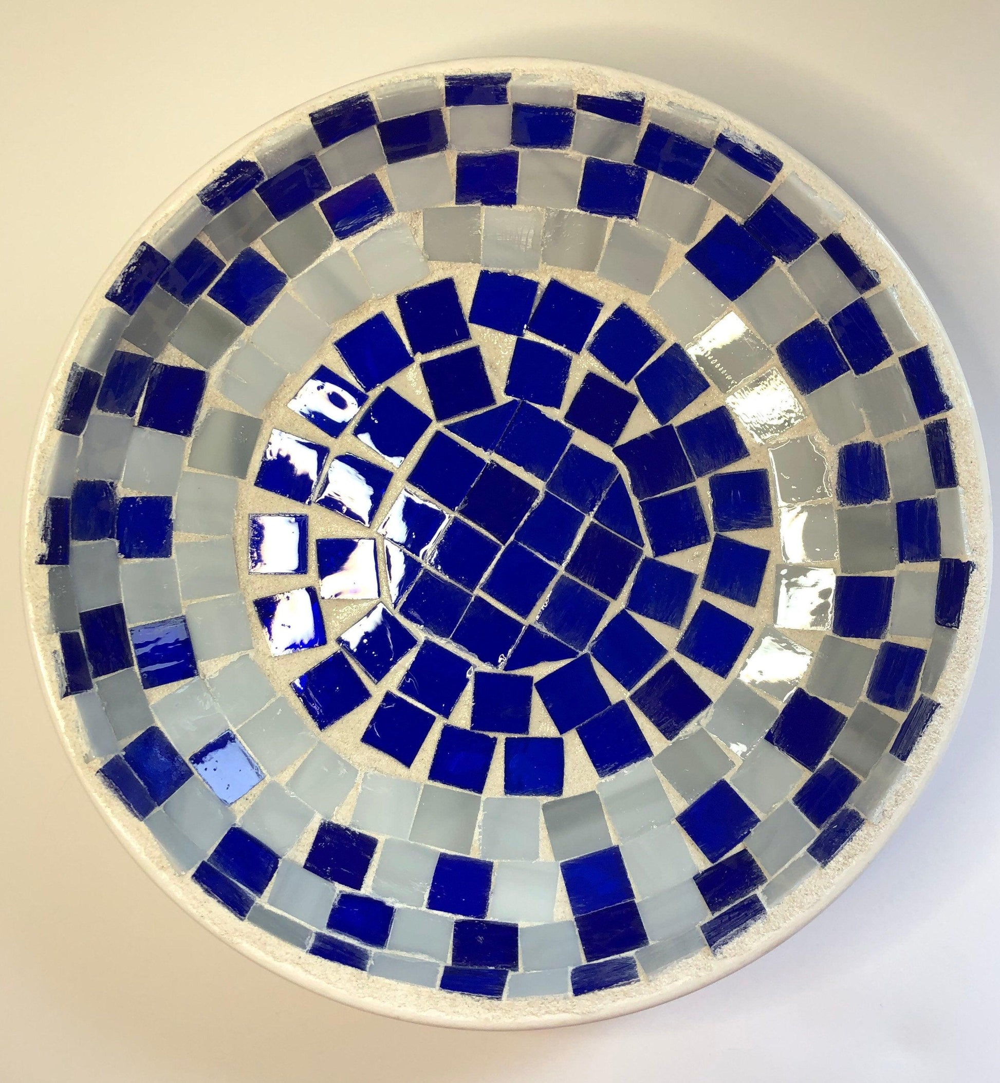 Blue and white stained glass bowl with intricate design, handcrafted by My Store, showcasing vibrant glasswork and detailed craftsmanship.