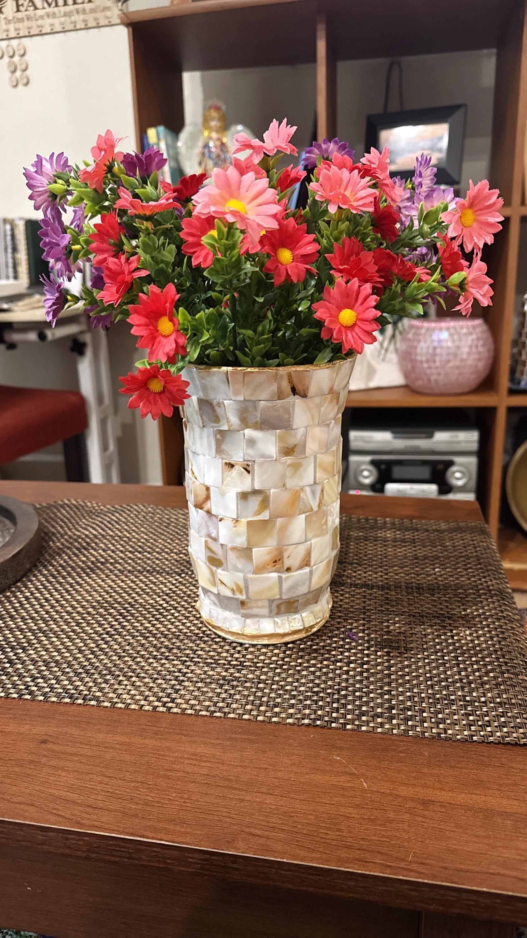 Handcrafted tapered mosaic vase with mother of pearl tiles, showcasing a detailed, elegant design perfect for decorative display.