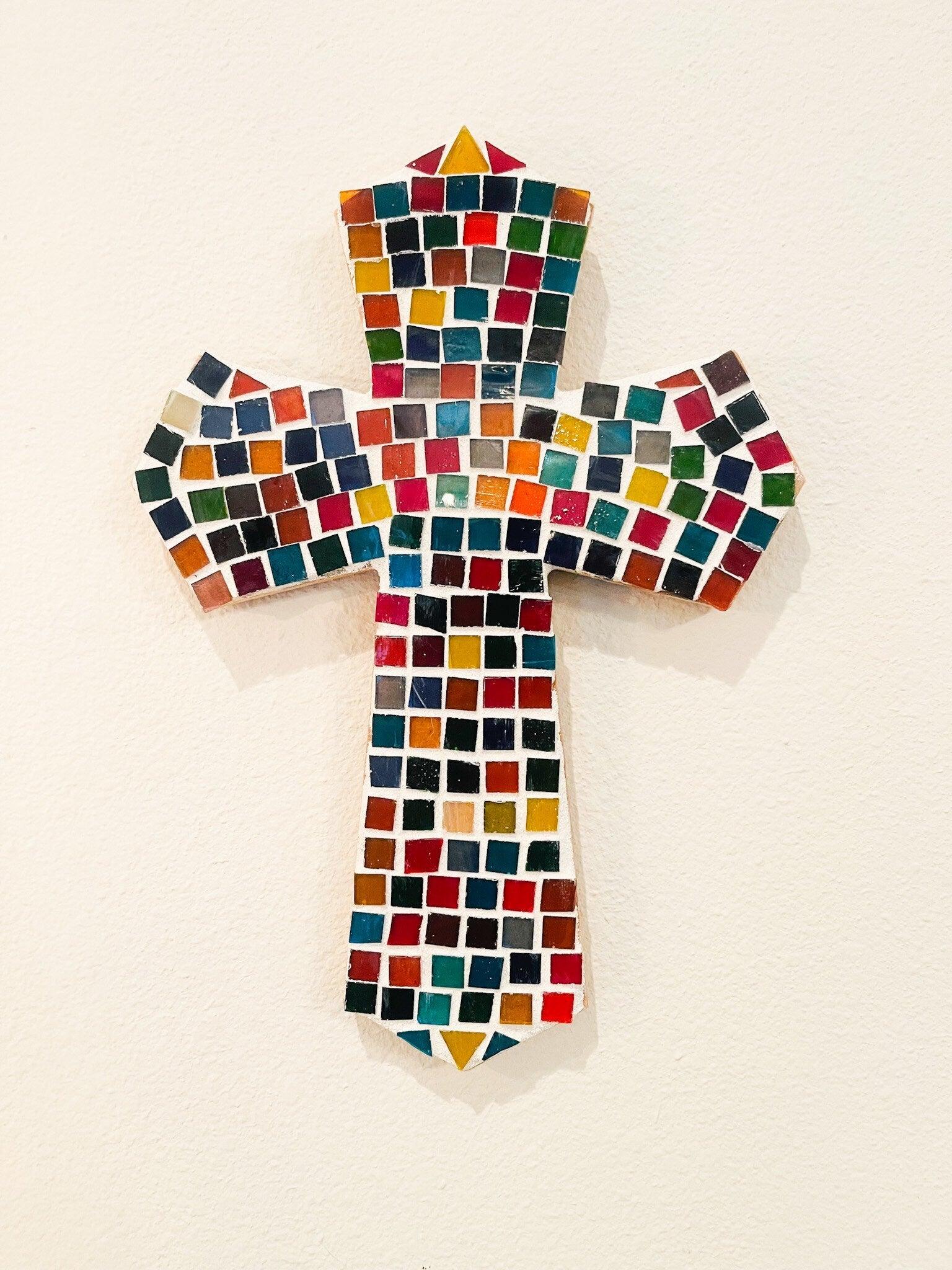 Colorful handcrafted mosaic cross with multicolor ceramic tiles, featuring intricate design and vibrant details.