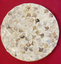 Handmade mother of pearl scallop mosaic decorative stand with intricate shell pattern and elegant design.
