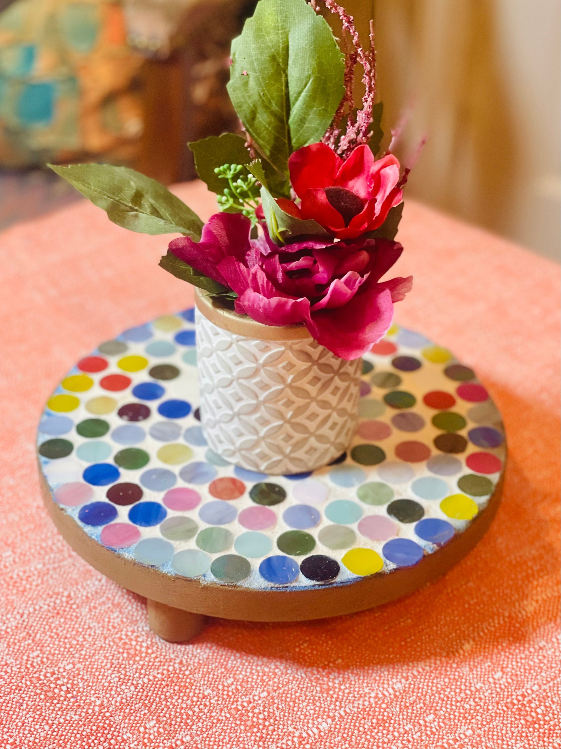 Colorful handcrafted polka dot rainbow mosaic plant stand by Miss Bette's Creations featuring vibrant tiles and sturdy design.