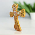 Handcrafted gold mosaic cross from Miss Bette's Creations, featuring intricate gold tile details and a detailed religious design.