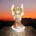 Ethereal Guardian Angel statue with detailed wings and flowing gown, crafted from stone, symbolizing protection and serenity