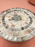 Handcrafted wooden mosaic plant stand with colorful tile design, perfect for displaying indoor or outdoor plants.