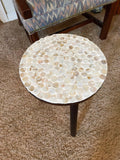 Tall Capiz shell mosaic plant stand with layered glass-like shells and metal frame, perfect for displaying indoor plants.