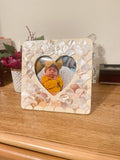 Mother of Pearl personalized photo frame with engraved name, featuring elegant design and smooth pearl finish.