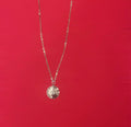 Vintage initial charm necklace with a silver chain and personalized initial pendant, featuring a classic and elegant design.