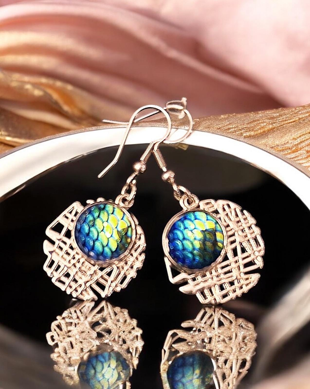 Vintage boho mermaid scale drop earrings with iridescent finish, featuring a delicate, ocean-inspired design.