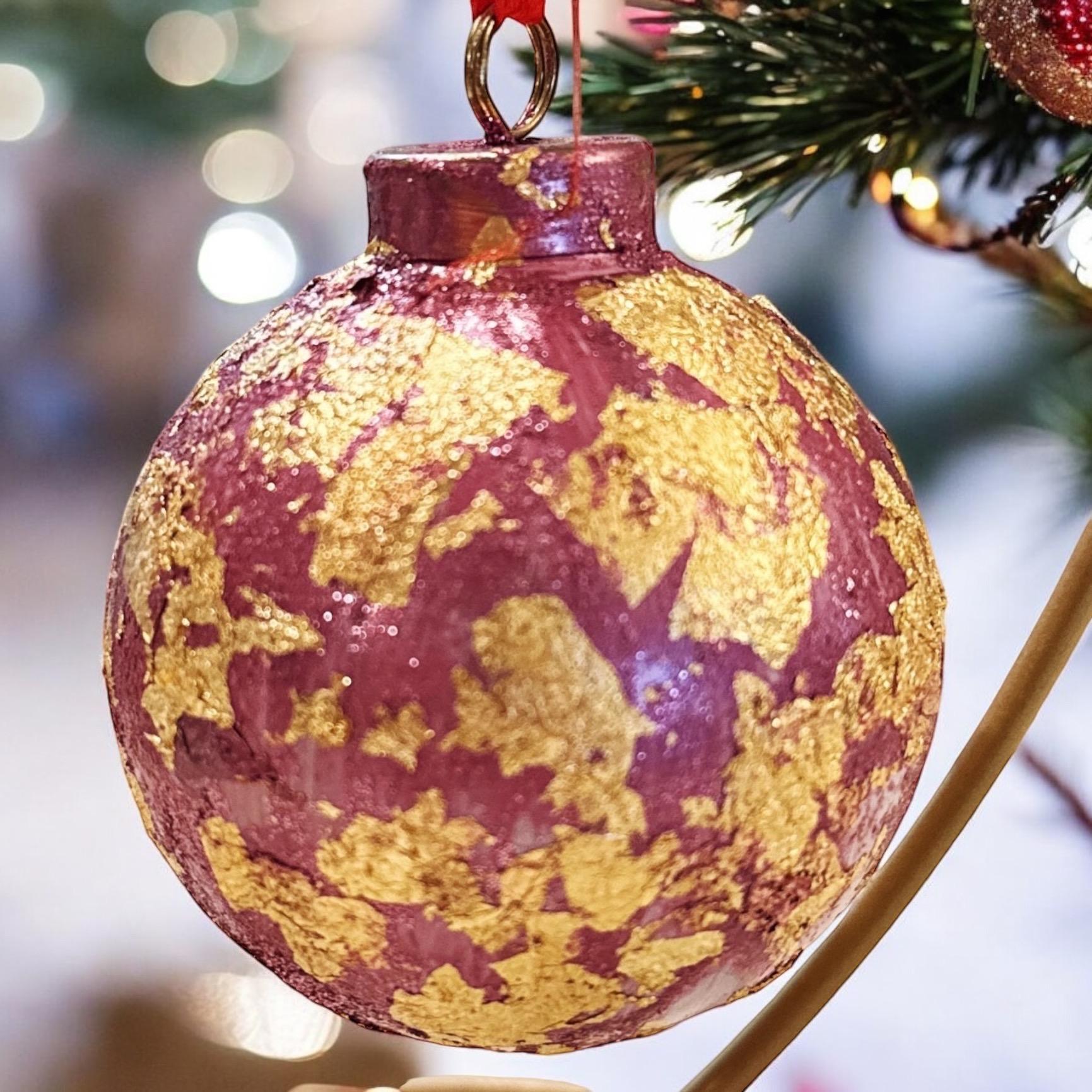 Rose and gold leaf Christmas ornament with intricate detailing, ideal for festive holiday decor.
