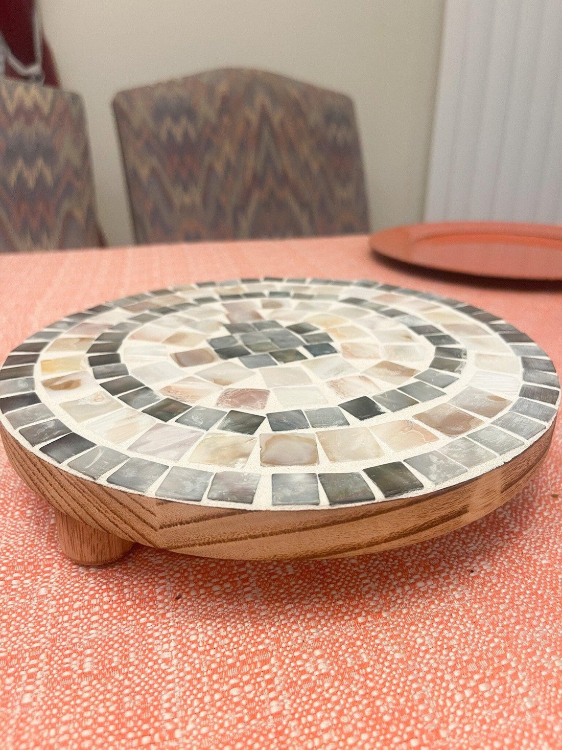 Handcrafted wooden mosaic plant stand with colorful tile design, perfect for indoor or outdoor plant displays.