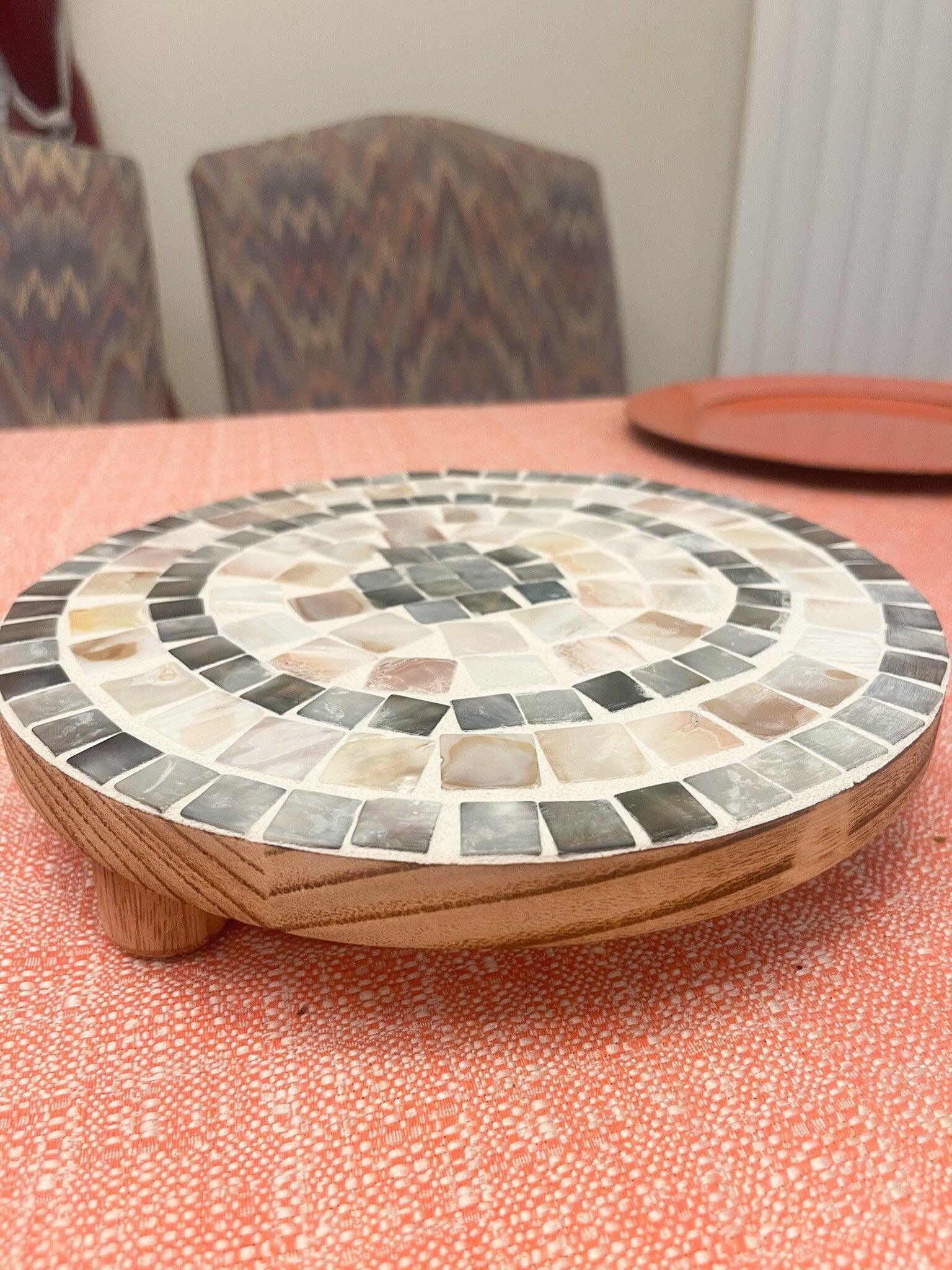 Handcrafted wooden mosaic plant stand with colorful tile design, perfect for indoor or outdoor plant displays.