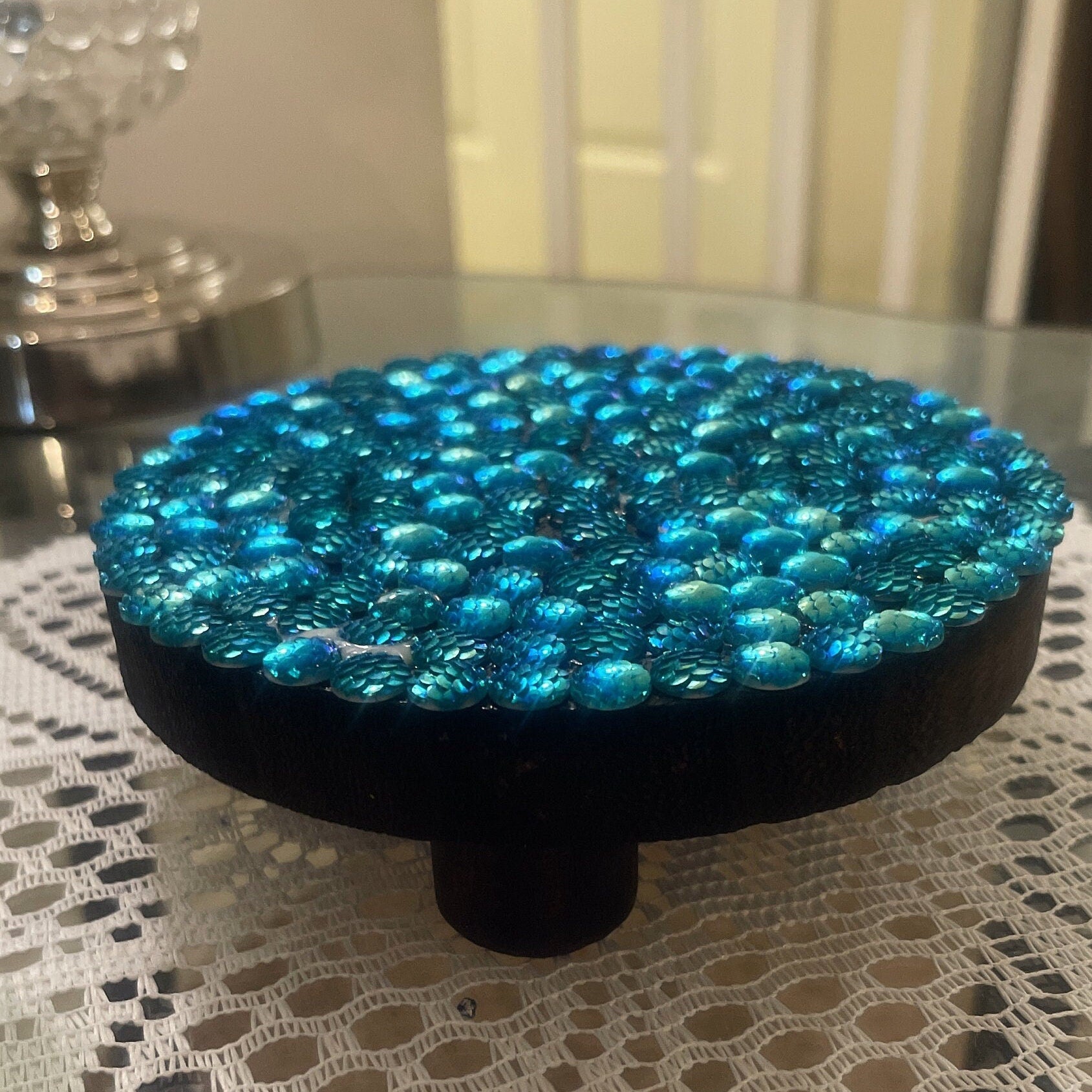 Artisanal turquoise cabochon mosaic plant stand by Miss Bette's Creations, featuring vibrant mosaic tile design and sturdy structure.