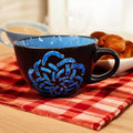 Handpainted extra large coffee mug from My Store with colorful floral design on white ceramic.