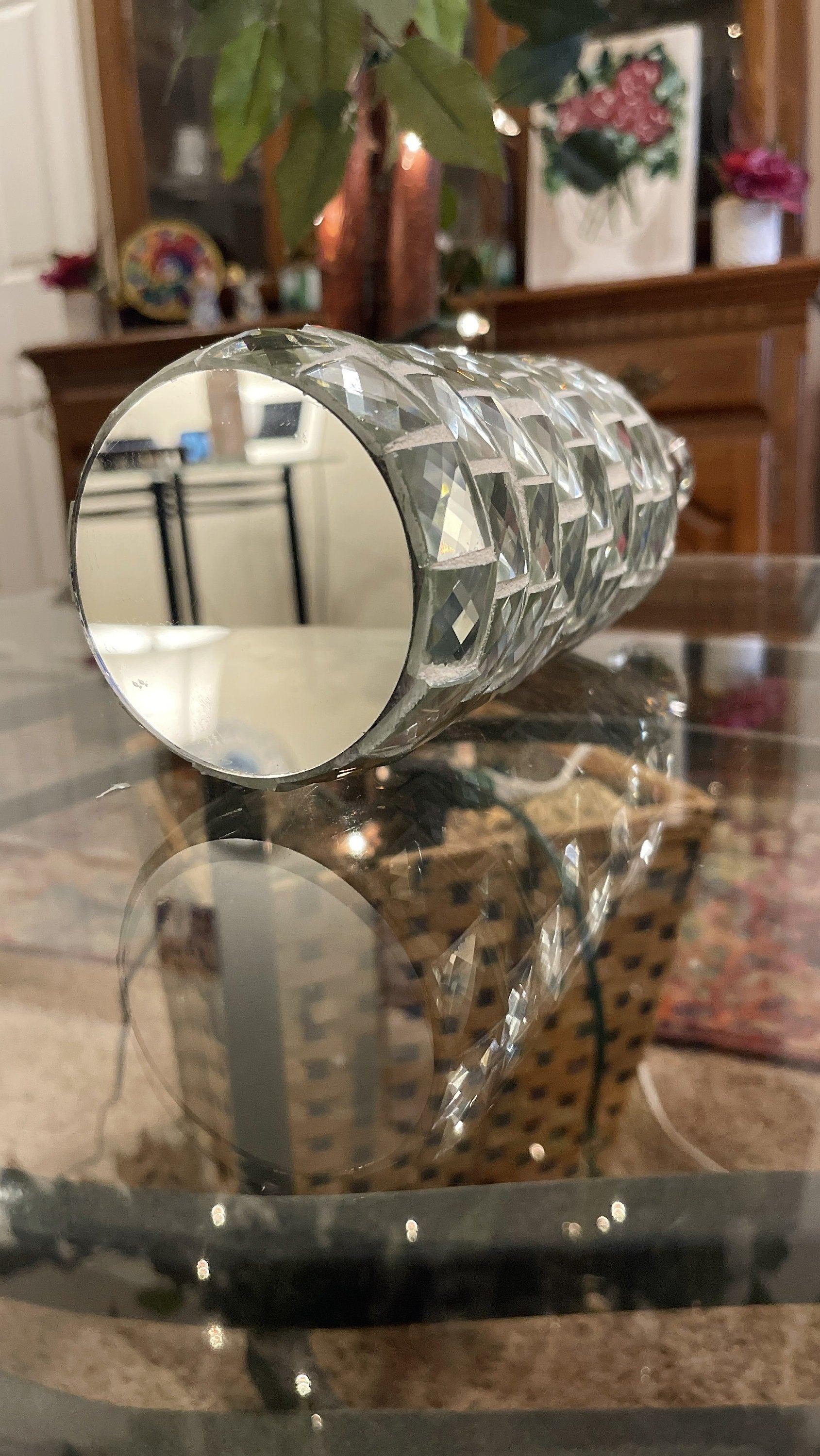 Silver mirrored mosaic wine decanter with intricate tile design, perfect for elegant serving and storage of wine.