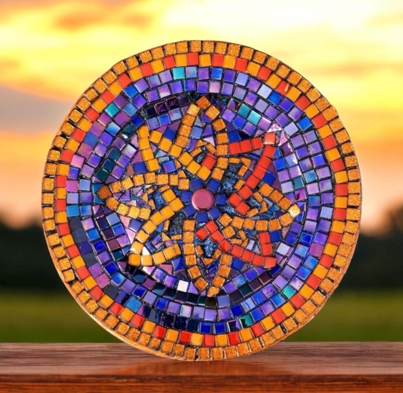 Handcrafted round mosaic wall art with colorful glass tiles and intricate patterns, perfect for decorative wall display.