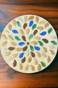 Handcrafted earth tone mosaic plant stand showcasing intricate tile patterns and sturdy wooden construction.