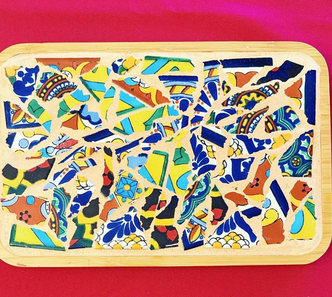 Handmade Mexican Talavera mosaic bamboo tray with colorful geometric patterns and natural bamboo handles.