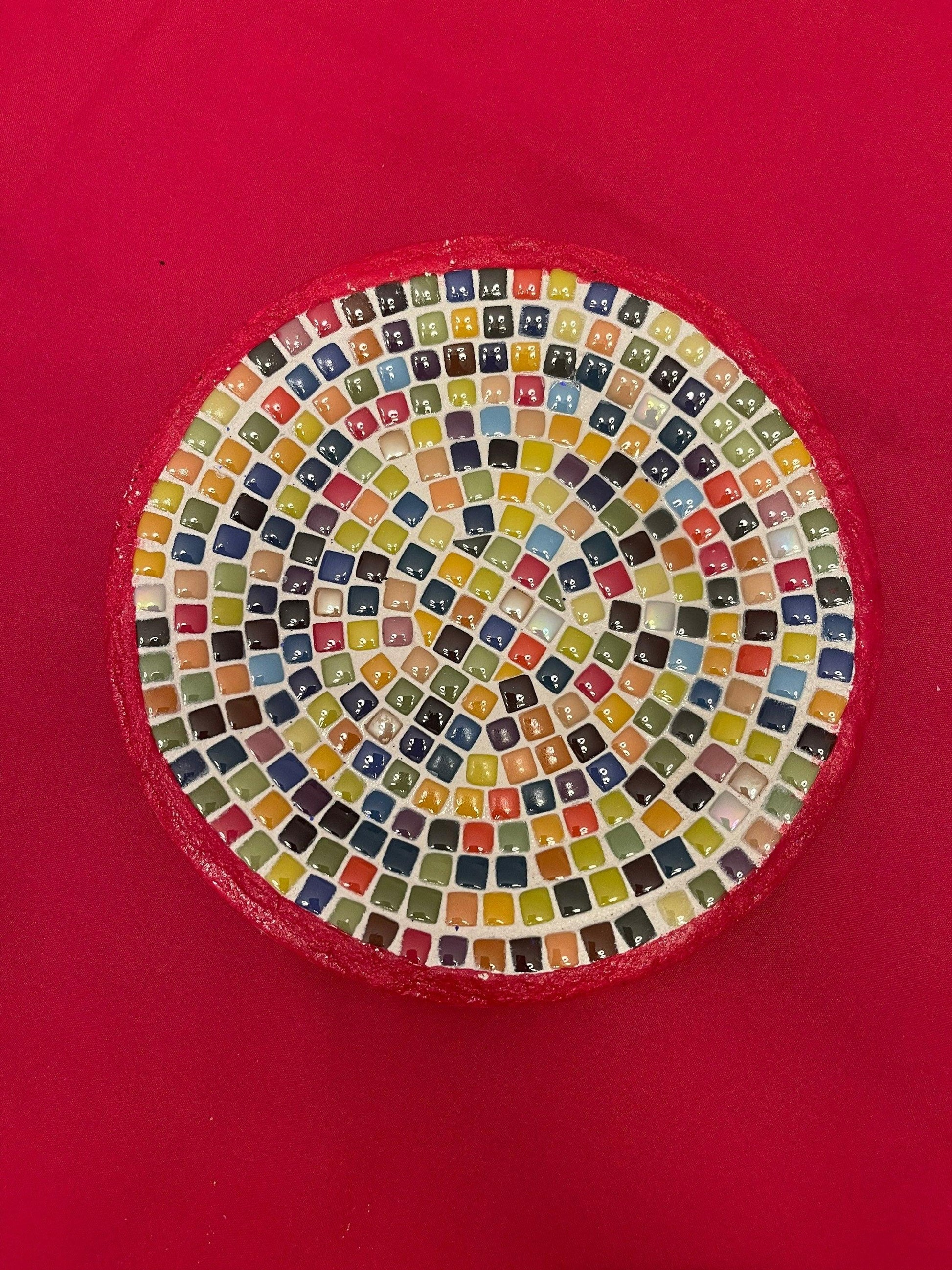 Colorful handcrafted rainbow mosaic decorative plate with intricate tile patterns, perfect for wall or table display.