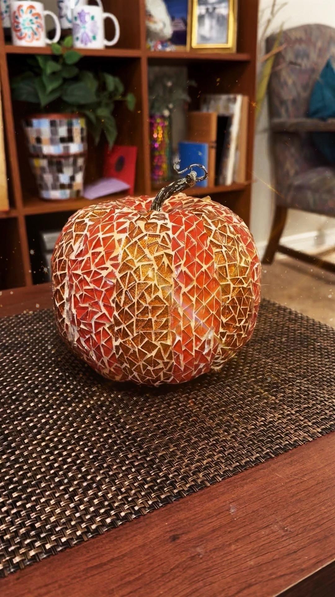 Handmade decorative fall pumpkin from My Store with orange and green accents, perfect for autumn home decor.