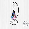 Handmade stained glass mosaic light bulb ornament with colorful holiday design, showcasing vibrant glass pieces and intricate craftsmanship.