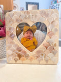 Mother of Pearl personalized photo frame with engraved customization, featuring a sleek, elegant design for cherished memories.