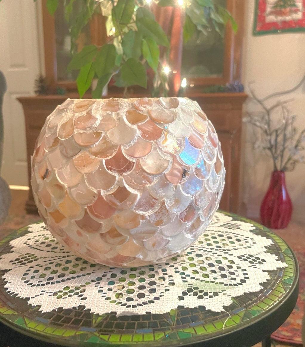 Handcrafted scalloped Capiz shell globe vase with intricate design, perfect for elegant home decor.