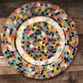 Vibrant handcrafted mosaic fruit bowl with colorful glass tiles, showcasing intricate design and artistic craftsmanship.