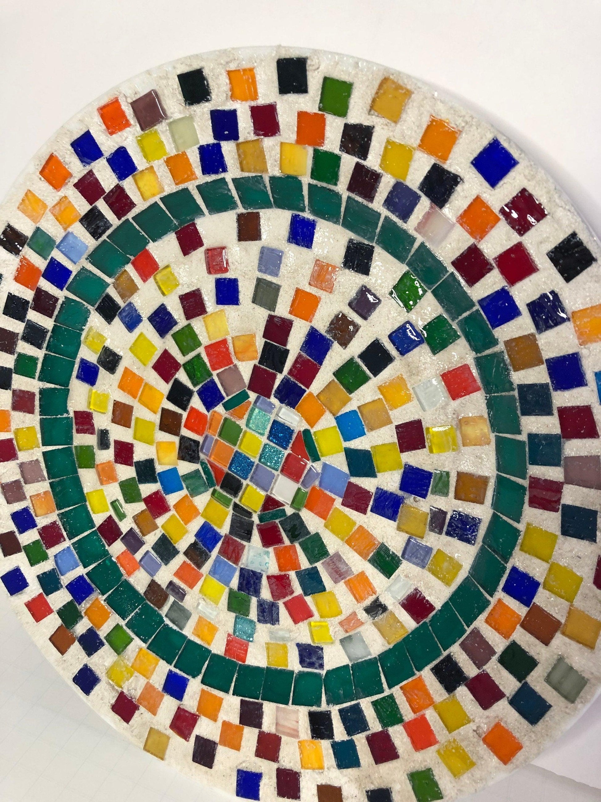 Colorful handcrafted rainbow tile decorative plate with vibrant painted patterns, ideal for wall decor or display.