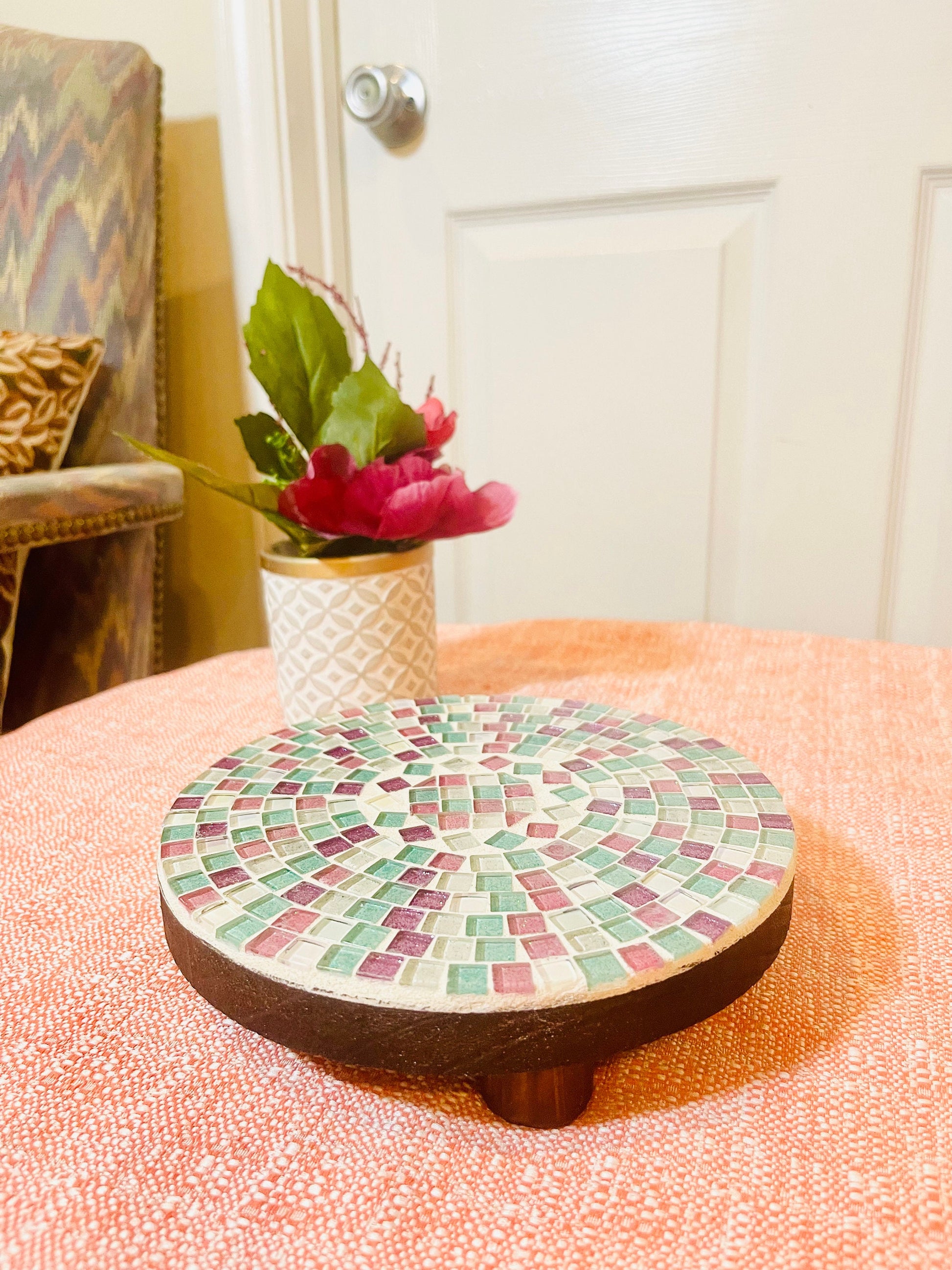 Handcrafted pink and green mosaic plant stand by Miss Bette's Creations, featuring intricate tile patterns and sturdy design.