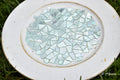 Multicolored rainbow mosaic fruit plate with vibrant, artistic ceramic design, perfect for serving fresh fruit in style.