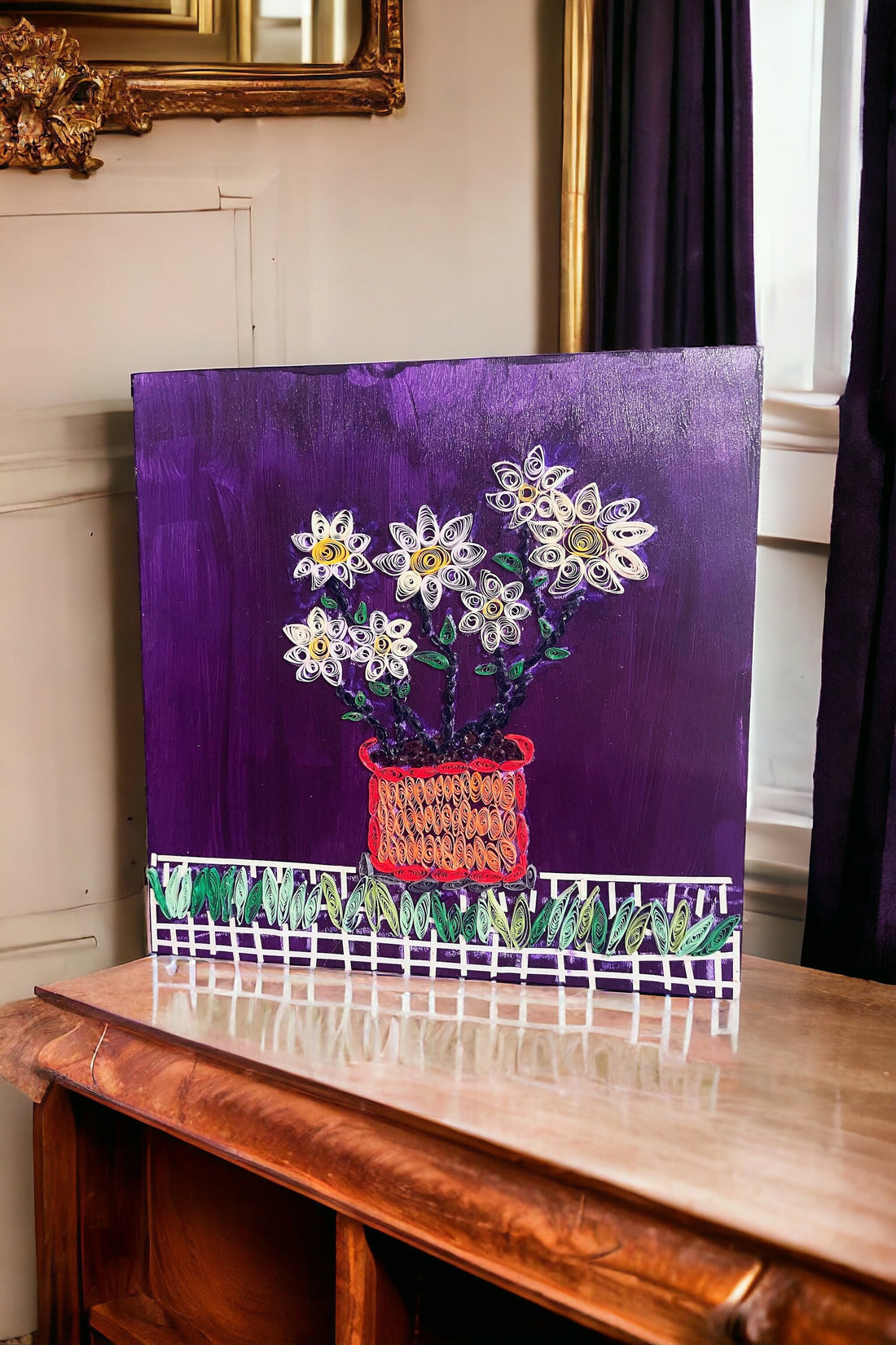 Original paper quilling artwork of a flower pot, showcasing intricate paper coil designs and vibrant colors.
