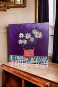 Original paper quilling artwork of a flower pot, showcasing intricate paper coil designs on a white background.